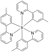 Skeletal formula of a chemical compound with iridium atom in its center, bonded to 6 benzol rings. The rings are pairwise connected to each other.