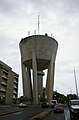 A water tower in Palmerston, Northern Territory with radio broadcasting and communications antennas.
