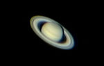 Saturn image using negative projection (Barlow lens) with a webcam attached to a 250mm Newtonian telescope. It is a composite images made from 10% of the best exposures out of 1200 images using freeware image stacking and sharpening software (Giotto)