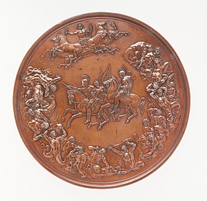 A bronze medal, with allegorical figures surrounding two equestrian figures in the centre
