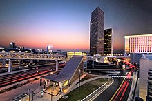 The Silver Line extension of the Washington Metro system opened in Tysons in 2014. Tysons Corner Sunset .jpg