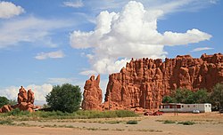 Settlements at U.S. Route 160 in front of red cliffs