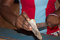 Cutting Koobi (Salted Tilapia)