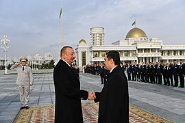 Berdimuhamedow and Ilham Aliyev in front of the Ceremony Field and Protocol Building.