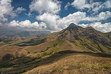 Anamudi, the highest peak in India outside the Himalayas, lies parallel to the Malabar Coast, in Western Ghats. AnaimudiPeak DSC 4834.jpg