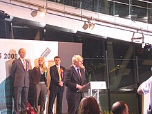 Johnson gave a victory speech in City Hall after being elected as the Mayor of London Boris Johnson on the podium.jpg