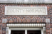 "County Normal" above an entrance to the normal school in Viroqua, Wisconsin CountyNormal.jpg