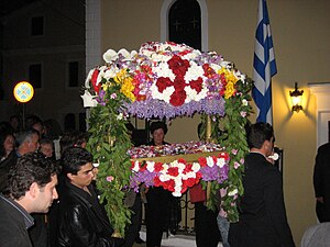 The Epitaphios is placed on a decorated bier, ...