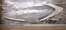 Black and white photograph of a stadium.