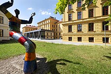 Statue in front of the restored building