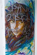 Portrait de femme par C215, à Londres.