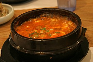Sundubu jjigae(순두부찌개), a Korean stew made with...