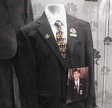The distinctive NBC page uniform, with a photo of Jack McBrayer, who portrayed NBC page Kenneth Parcell on 30 Rock NBC Page Uniform (6279769410).jpg