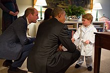 With his father meeting Barack Obama and Michelle Obama at Kensington Palace in 2016 Obamas with the Royals (26488482612).jpg