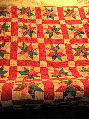my new (new to me) antique quilt! i lurve it.