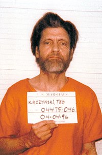Ted Kaczynski AKA "The Unabomber" in a mug shot taken shortly after his arrest in April 1996. Ted Kaczynski full mugshot.jpg