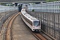 Un train de ligne 9 (Type B) quitte le tunnel près de Gare de Linpingnan