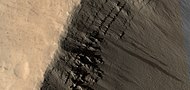 Close, color view of layers near top of crater, as seen by HiRISE under HiWish program