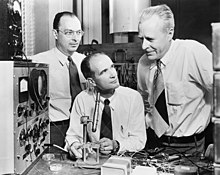 John Bardeen, William Shockley, and Walter Brattain at Bell Labs in 1948; Bardeen and Brattain invented the point-contact transistor in 1947 and Shockley invented the bipolar junction transistor in 1948. Bardeen Shockley Brattain 1948.JPG