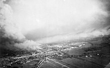 Rotterdam's burning city centre after the bombing. Bundesarchiv Bild 141-1114, Rotterdam, Luftaufnahme von Branden.jpg