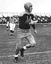 A photo of Don Hutson running with the football