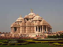 A complete view of Akshardham temple with people entering the temple