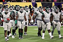 Delta Devils football players during a game in October 2023 PVAMU vs. MVSU 10-7-23 (35) (cropped).jpg