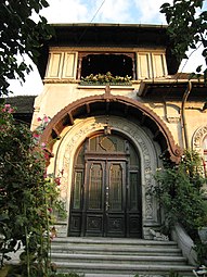 Porta d'una casa a Ploiești, amb tendal de fusta, de Toma T. Socolescu