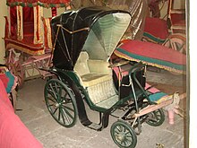 An old polocart displayed at City Palace, Jaipur. The museum also displays a "night polo ball" with a rotating platform on which a candle is placed. Polo Cart at City Palace, Jaipur.jpg