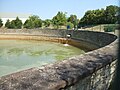 Mündung des Solgrabens ins Solebecken mit Meter tiefem Sturz ins Becken