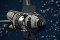 Foto del Discovery en órbita con las compuertas abiertas