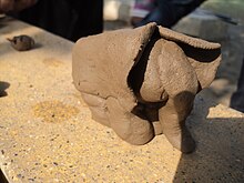 This elephant was made out of mud during play with children. Art with Wet mud in Panjab.JPG