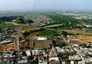 Aerial view shows Bayamón River and Canton Mall (center)