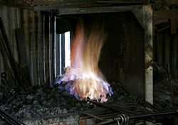 A blacksmith's fire, used primarily for forging iron.