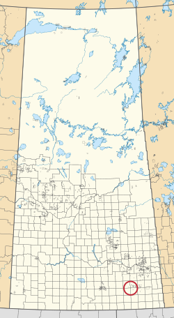 A map of the province of Saskatchewan showing 297 rural municipalities and hundreds of small Indian reserves. One is highlighted with a red circle.