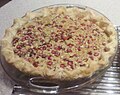 Cranberry-walnut pie made with walnuts and maple syrup