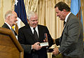 Lt. Gen. Brent Scowcroft, left, and Chairman of the Board John B. Adams, Jr., present the George C. Marshall Foundation Award to Secretary of Defense Robert M. Gates. October 16, 2009.