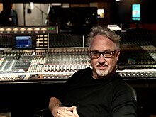 Film composer Alex Wurman at a recording studio mixing board