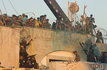 Residents protest during the forced evacuation of the Israeli community Kfar Darom. August 18, 2005. Flickr - Israel Defense Forces - The Evacuation of Kfar Darom (4).jpg