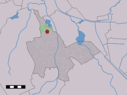 The village (dark red) and the statistical district (light green) of Paterswolde in the municipality of Tynaarlo.