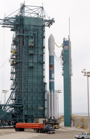 Mobile Service Tower rolls over the Delta II on SLC-2W.jpg