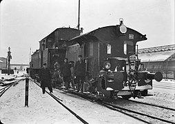 Attelée à un locotracteur Sik série 200 en 1940.