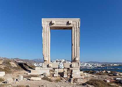 Coexistence or contrast of modern and classics Manfred Werner View through Portara on the peninsula Palátia towards Chora of Naxos with its port