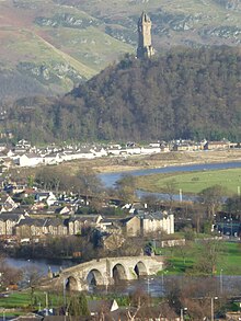 Old Stirling Bridge and the Abbey Craig with the Wallace Monument, Stirling Scotland.jpg