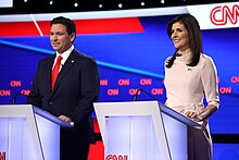 Ron DeSantis and Nikki Haley at the CNN Republican Presidential Debate in Des Moines, Iowa. Ron DeSantis & Nikki Haley (53460469154).jpg