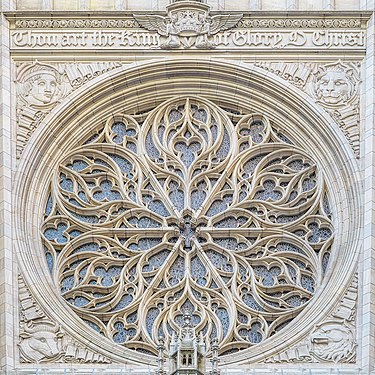 Limestone rose window at the Saint Thomas Church in Manhattan, New York City. It has some flame style elements of Flamboyant Gothic.