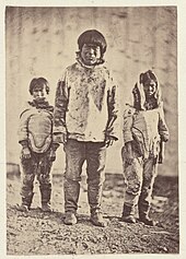 1869 photograph of Greenlandic Inuit Some of the intelligent inhabitants, man, boy, and girl.jpg