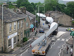 Turbine blade convoy for Scout Moor Wind Farm passing through Edenfield. Turbine Blade Convoy Passing through Edenfield.jpg