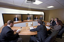 An Online Video Web Conference in an office, December 2010. App03 telepresence 01 with light.jpg