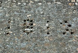 Detail of the date 1812 engraved with shots fired by British artillerymen to commemorate the assault on the two bastions.